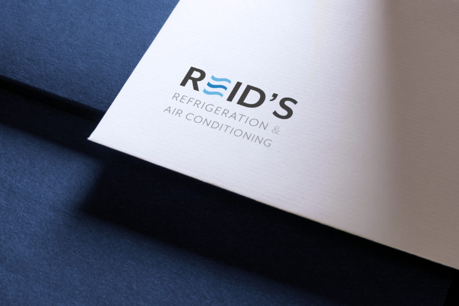 Reids Refrigeration and Air-conditioning Logo shown on white paper against a blue background